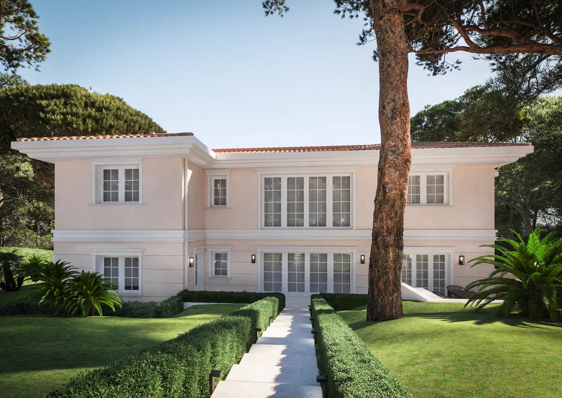 Symmetrical villa façade behind a hedged garden path — Cannes Villa, Cannes