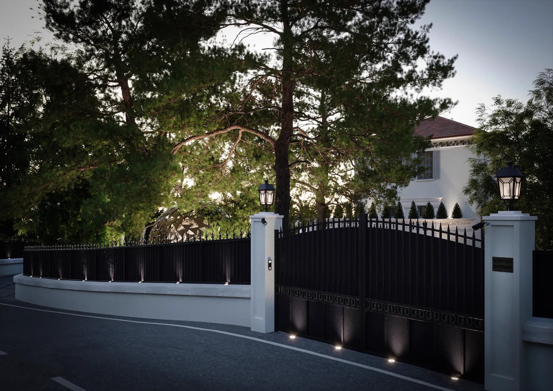 Gated entrance under pine trees with lit piers — Villa at Cap d'Ail, Cap d'Ail