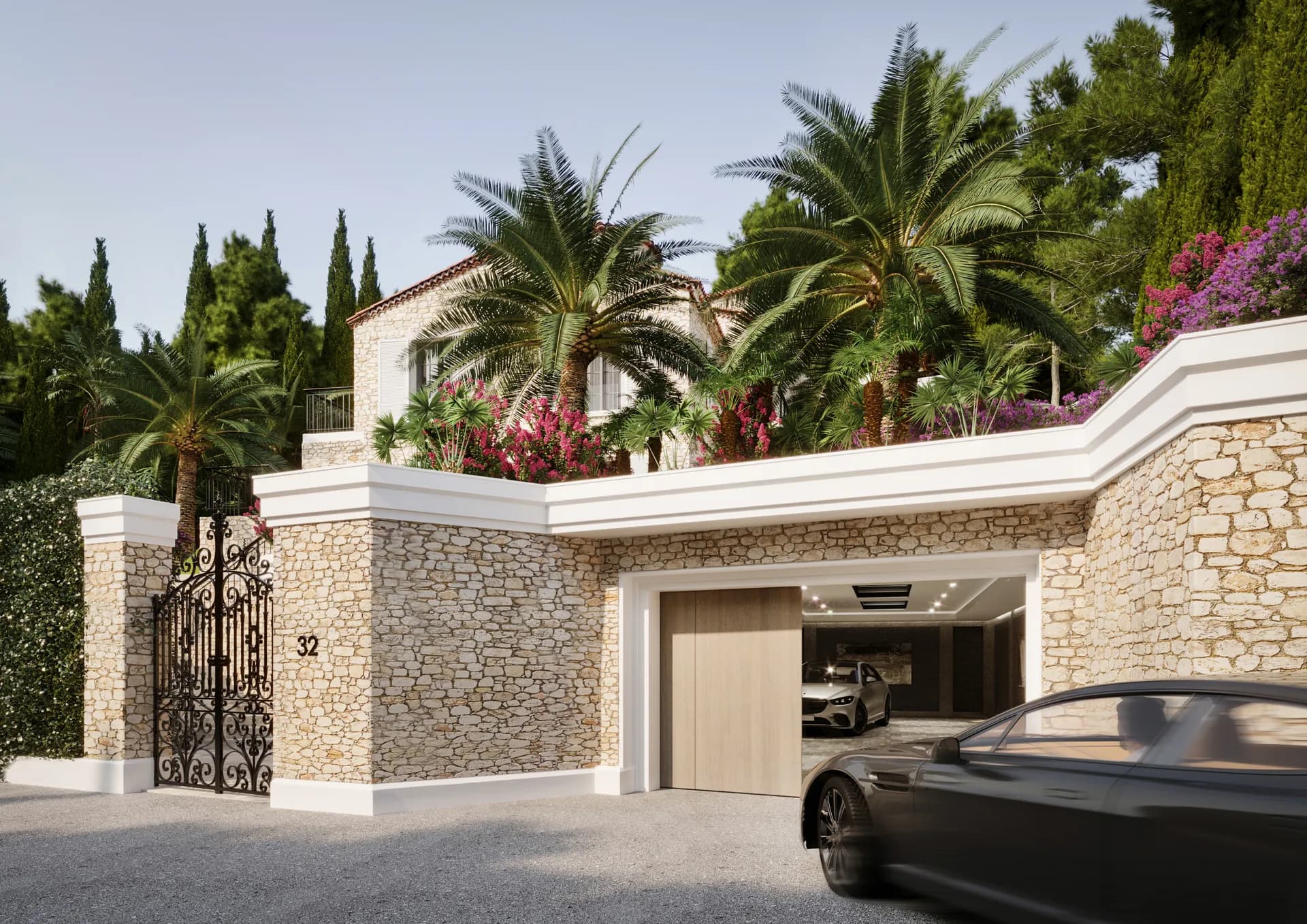 Villa entrance with wrought-iron gates, stone walls and a garage — Villa La Belle, Saint-Jean-Cap-Ferrat