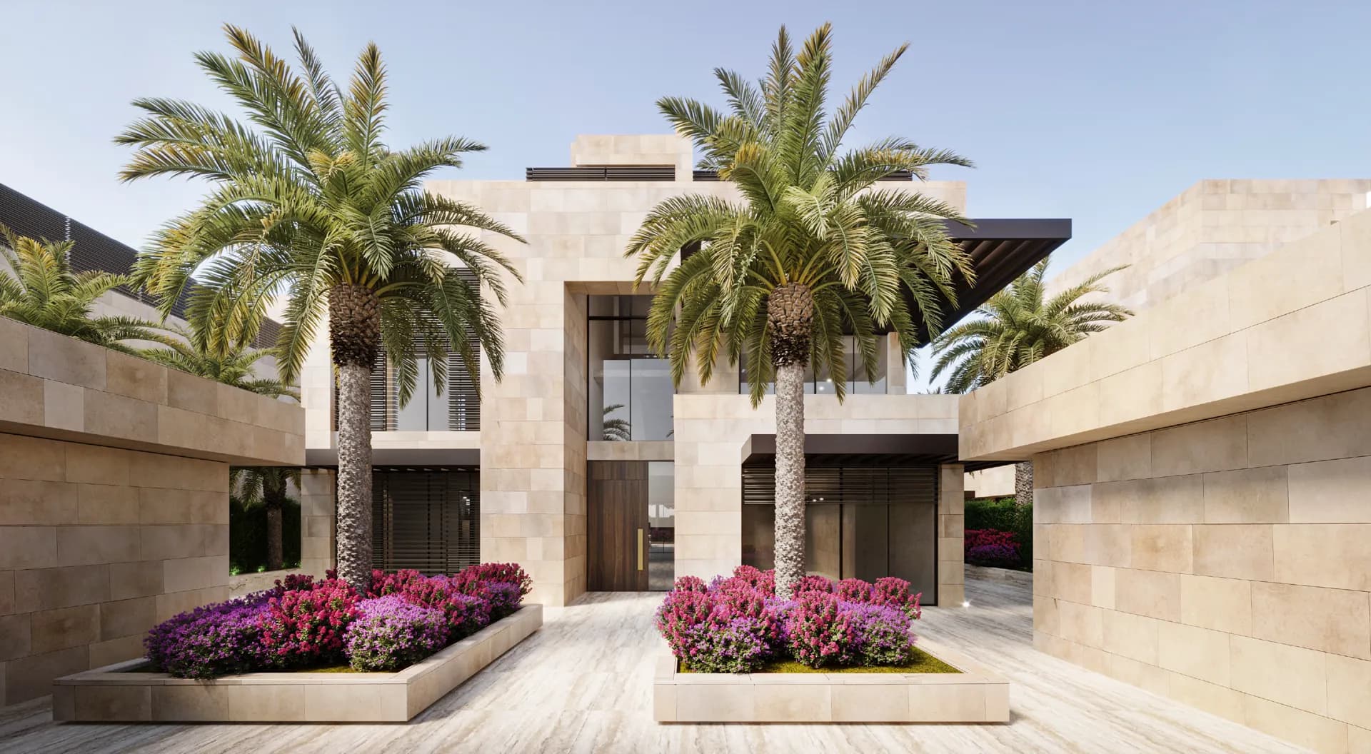 Stone-clad villa entrance with palms and flowering planters — Villa Nudra, Saadiyat Island